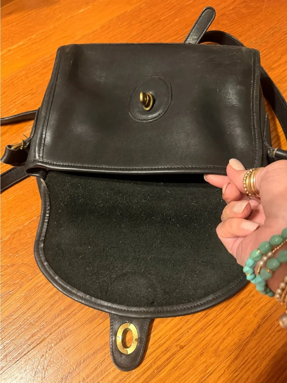 Vintage Early 1980’s Coach Black Leather Crossbody with Brass Turnlock Accent